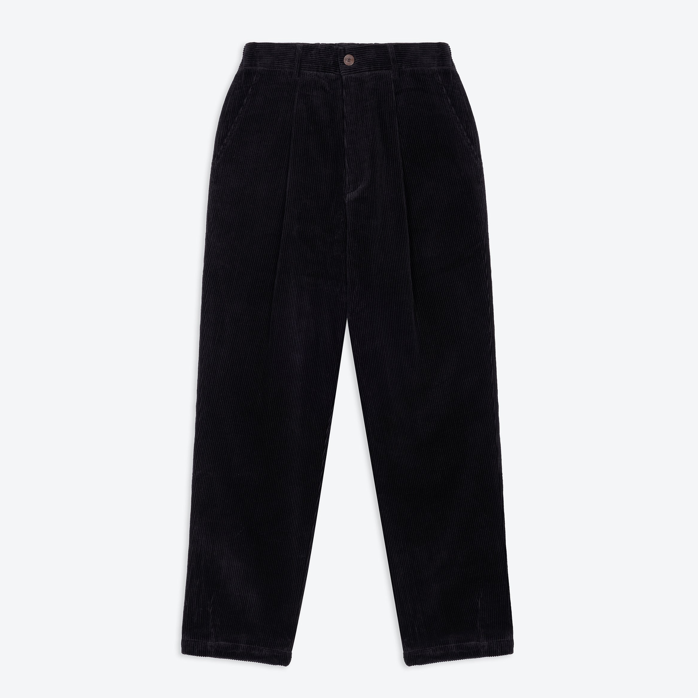 A pair of black corduroy easy trousers with a waistband, pockets, and pleats.