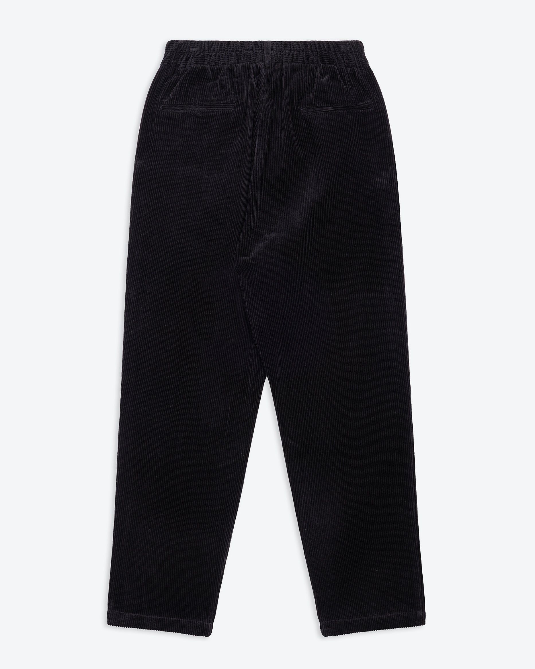 A pair of jet black lowie corduroy easy trouser with a 4-pocket design, belt loops, and pleats.