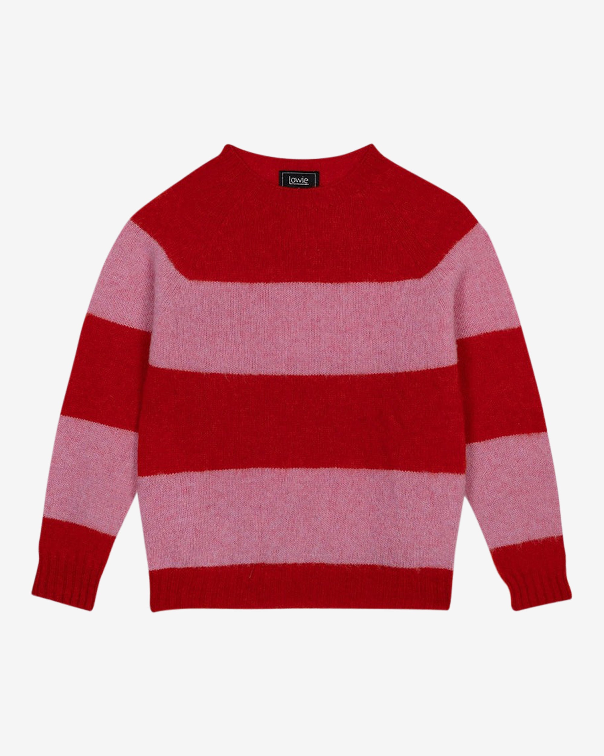 A striped Scottish jumper in pink and red with a round neckline and ribbed-knit hemline and trim around neck and wrist.