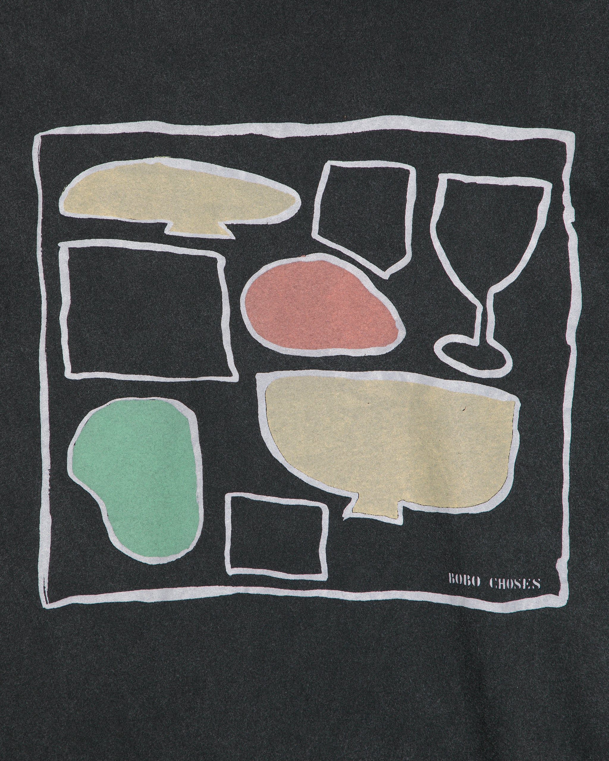 Black t-shirt with colorful abstract shapes and 'Bobby Chones' branding.