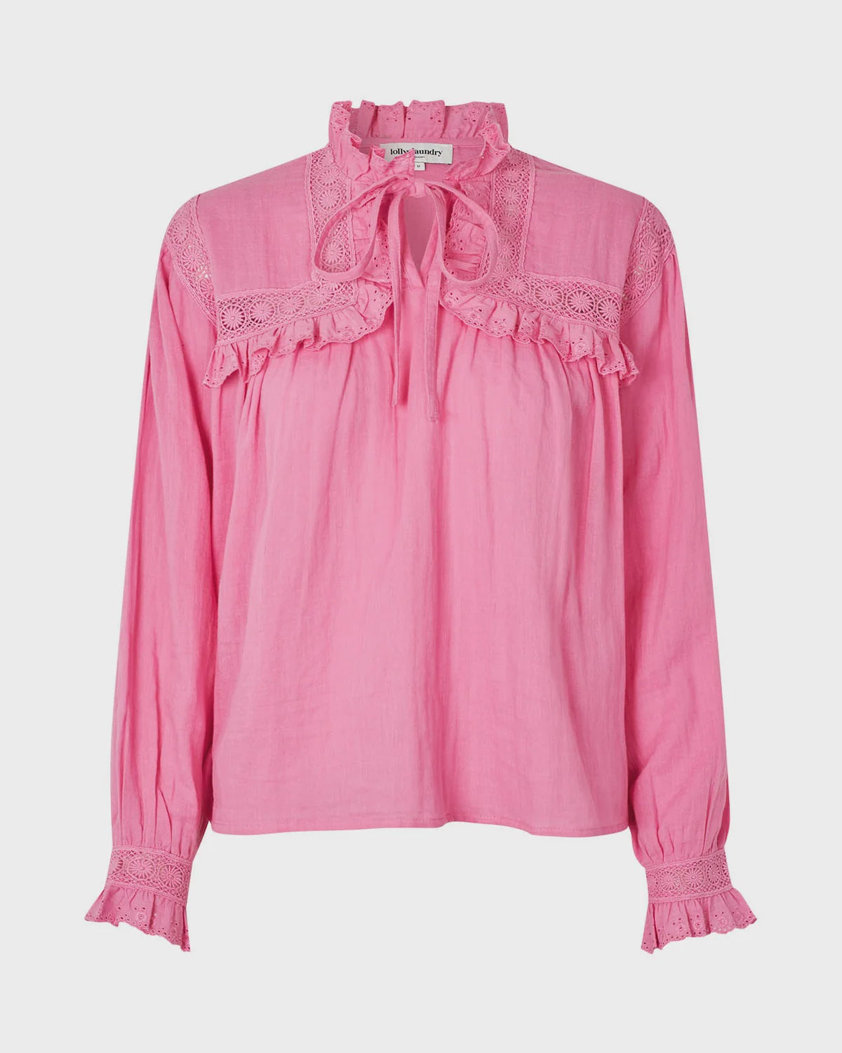 Pink blouse with lace details on a white background