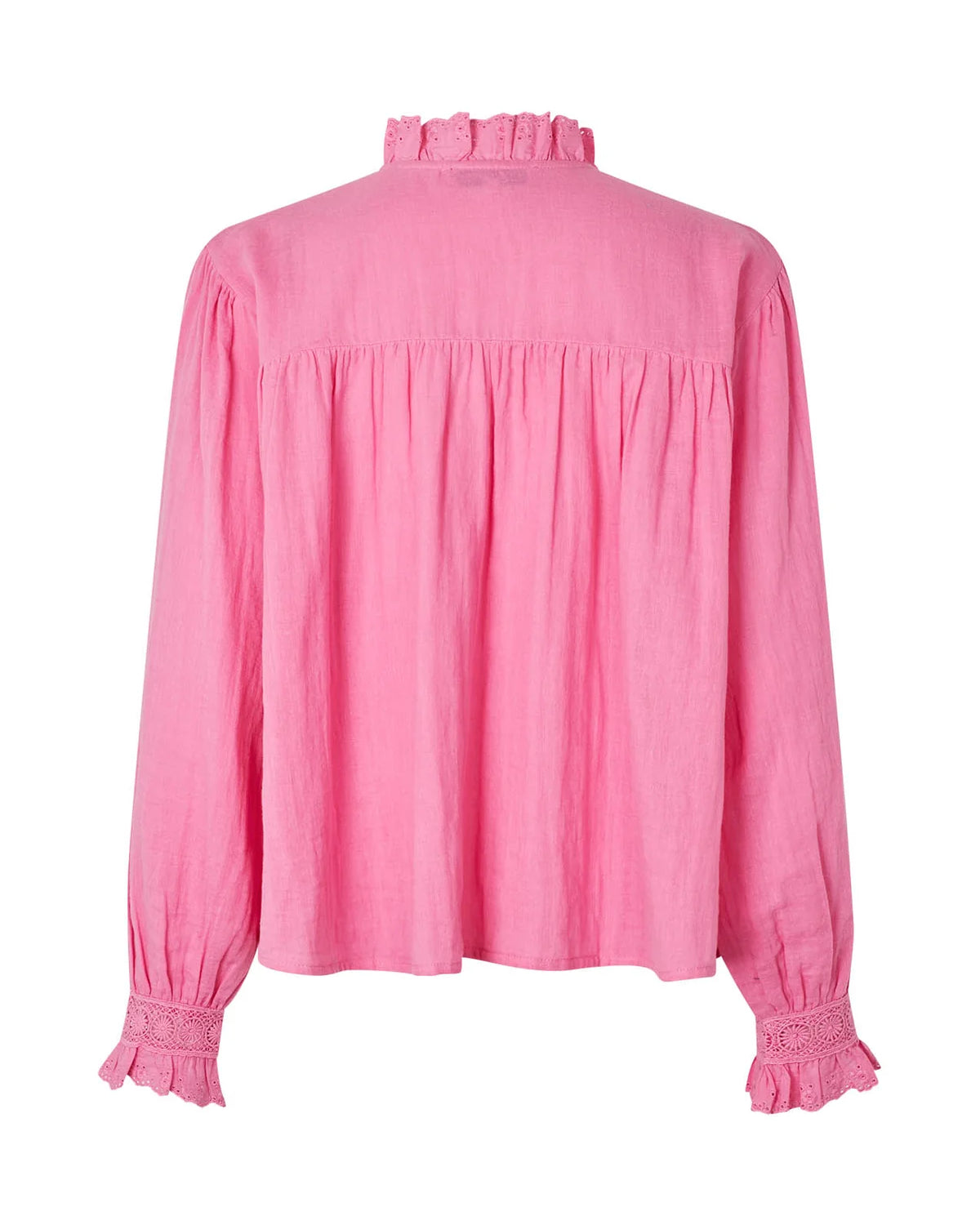 Pink blouse with lace details on a white background