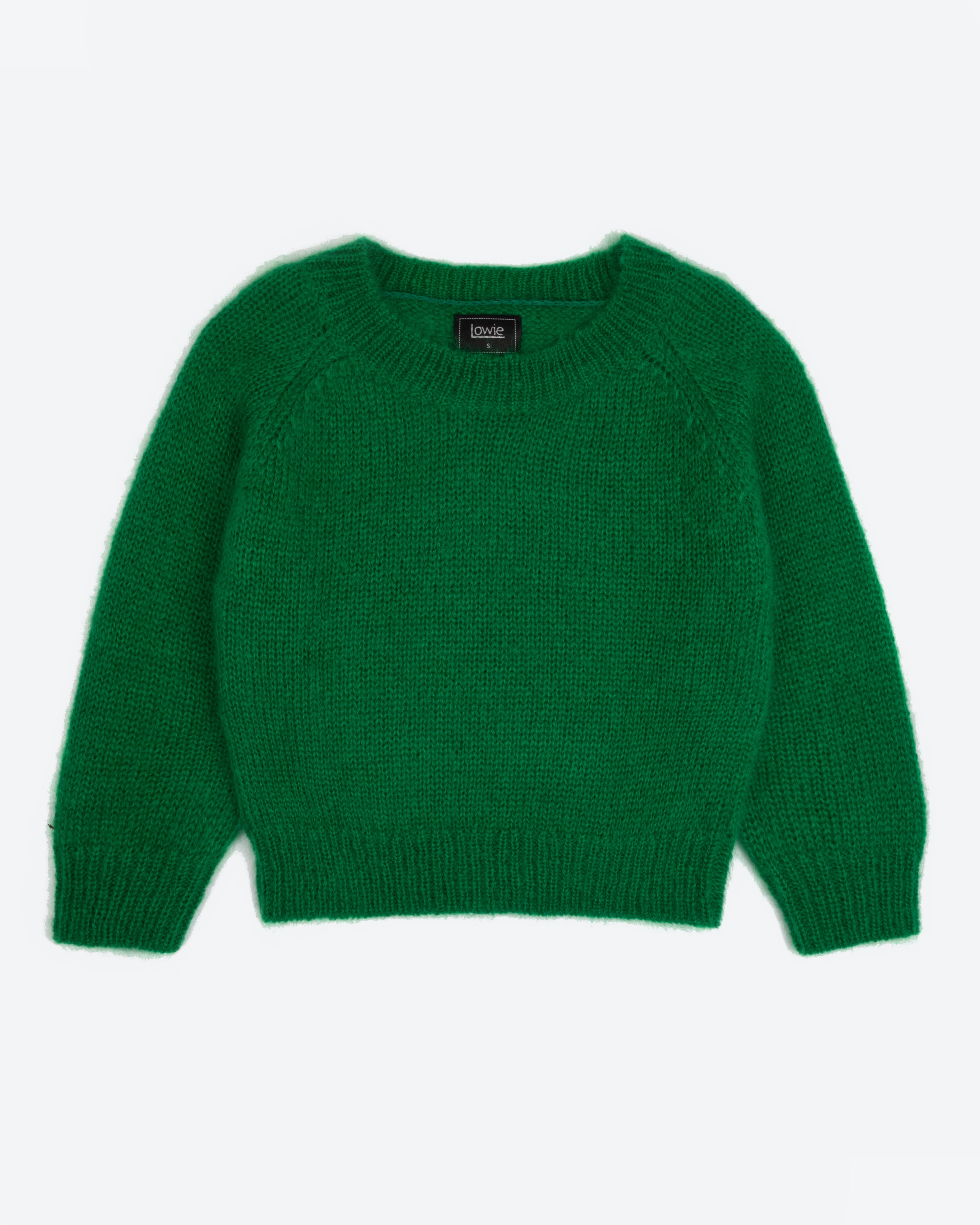 A green mohair jumper with long sleeves and a round neckline laid flat on a plain background.
