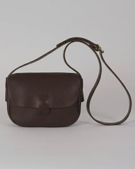 A dark brown textured leather shoulder bag with a long matching strap, displayed against a neutral light gray background.