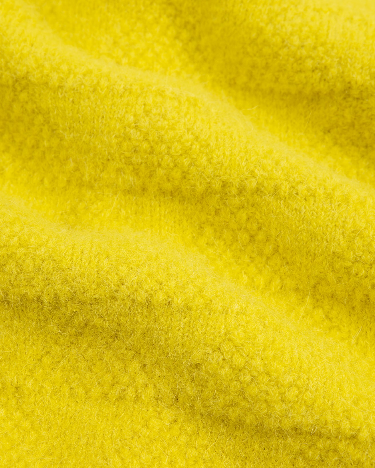 Close-up of yellow fabric texture