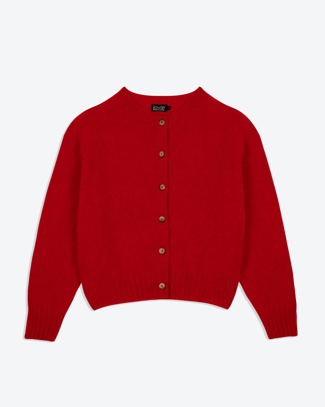 Red cardigan with button details on a white background