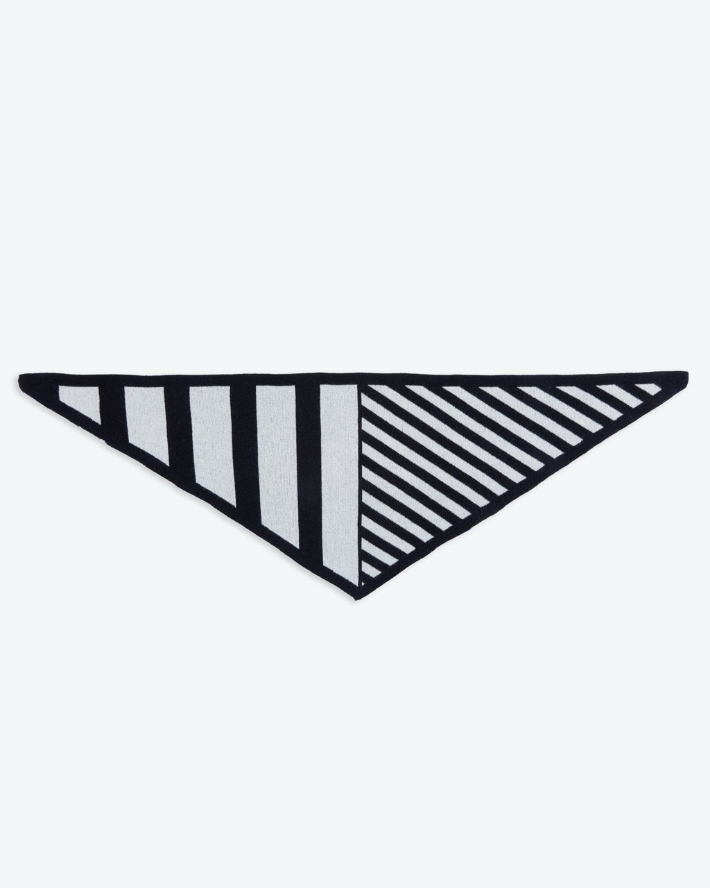 Black and white striped triangle-shaped object on a white background