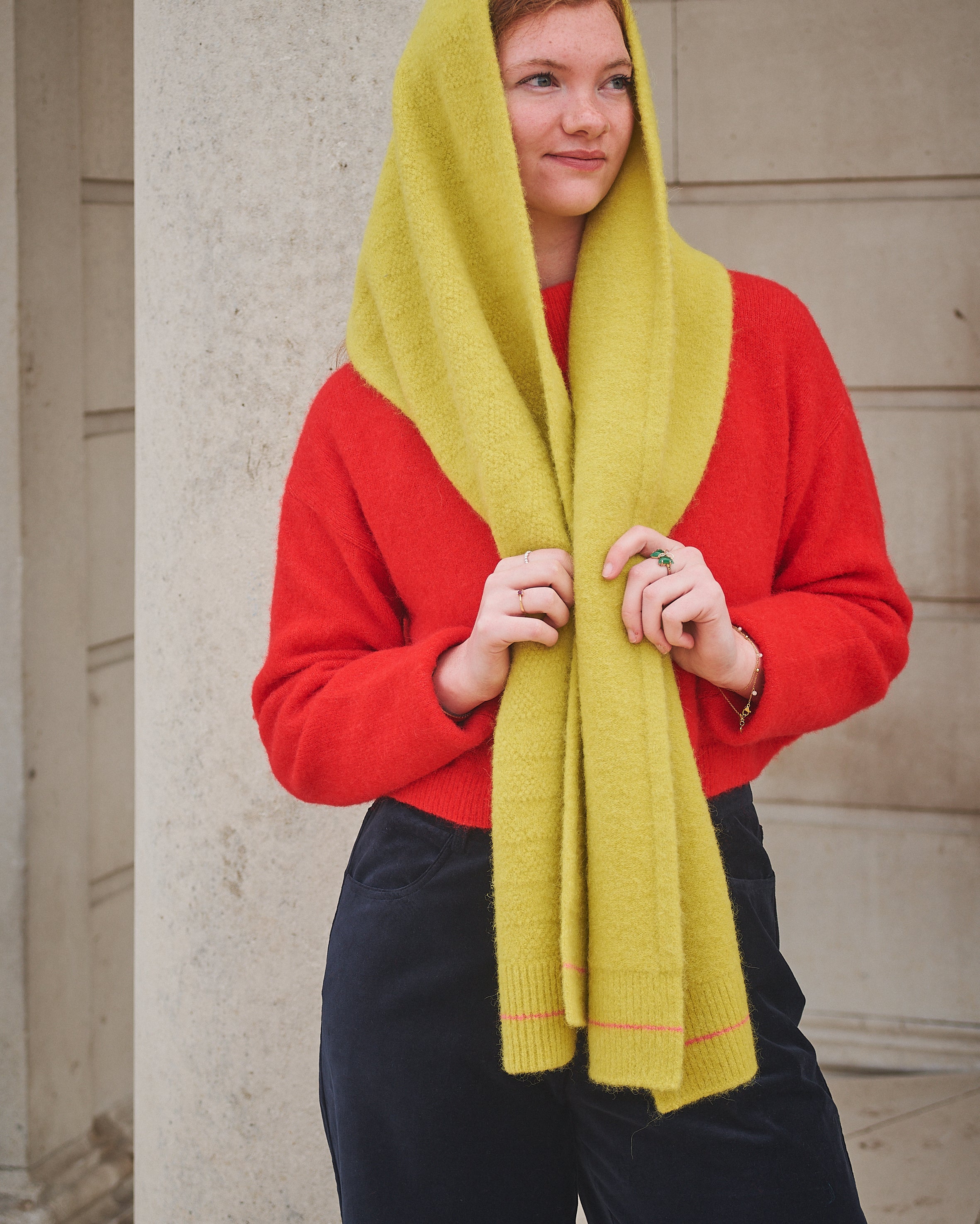 Person Wearing Yellow Scarf and red jumper