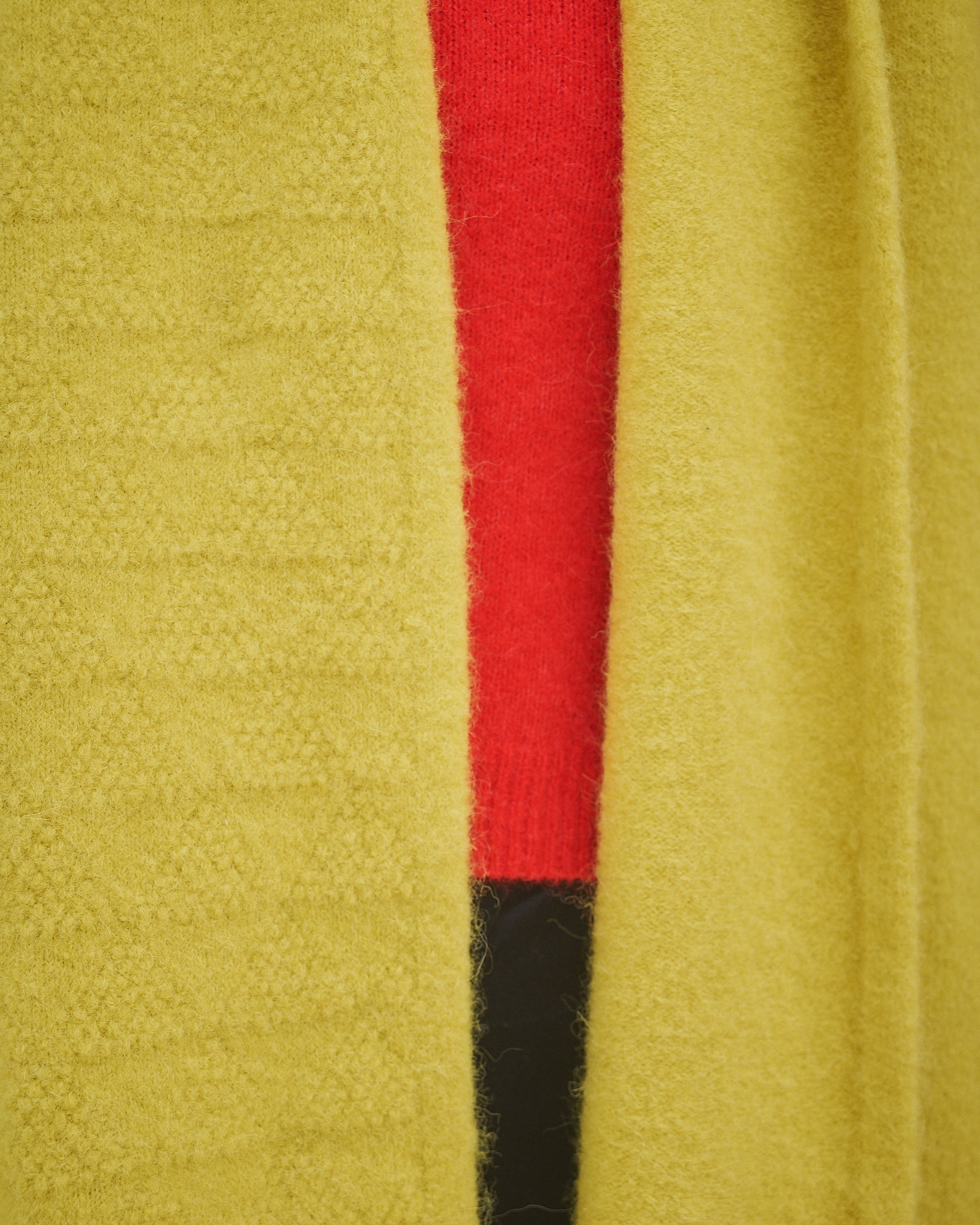 Person Wearing Yellow Scarf and red jumper