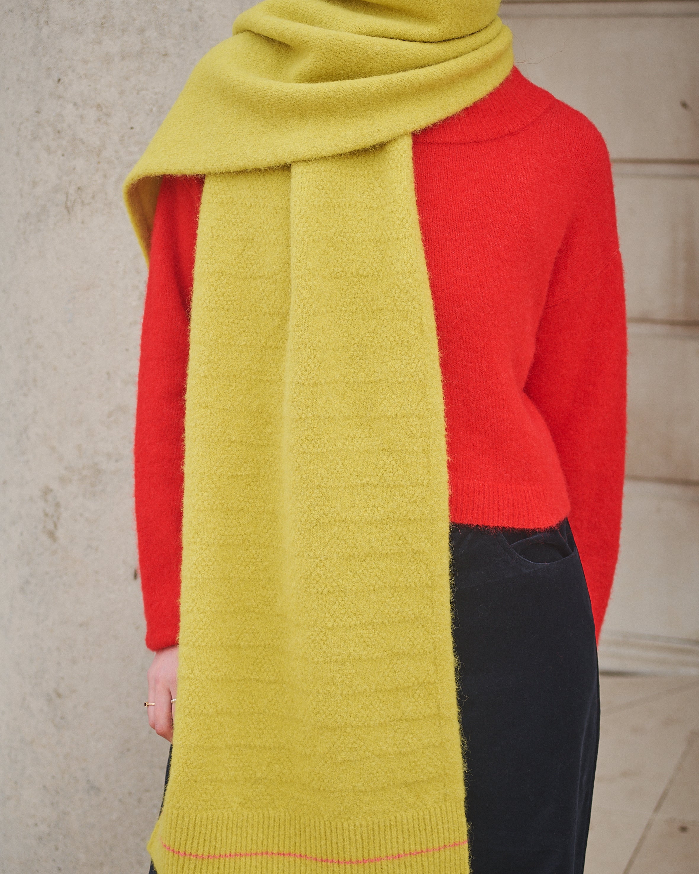 Person Wearing Yellow Scarf and red jumper