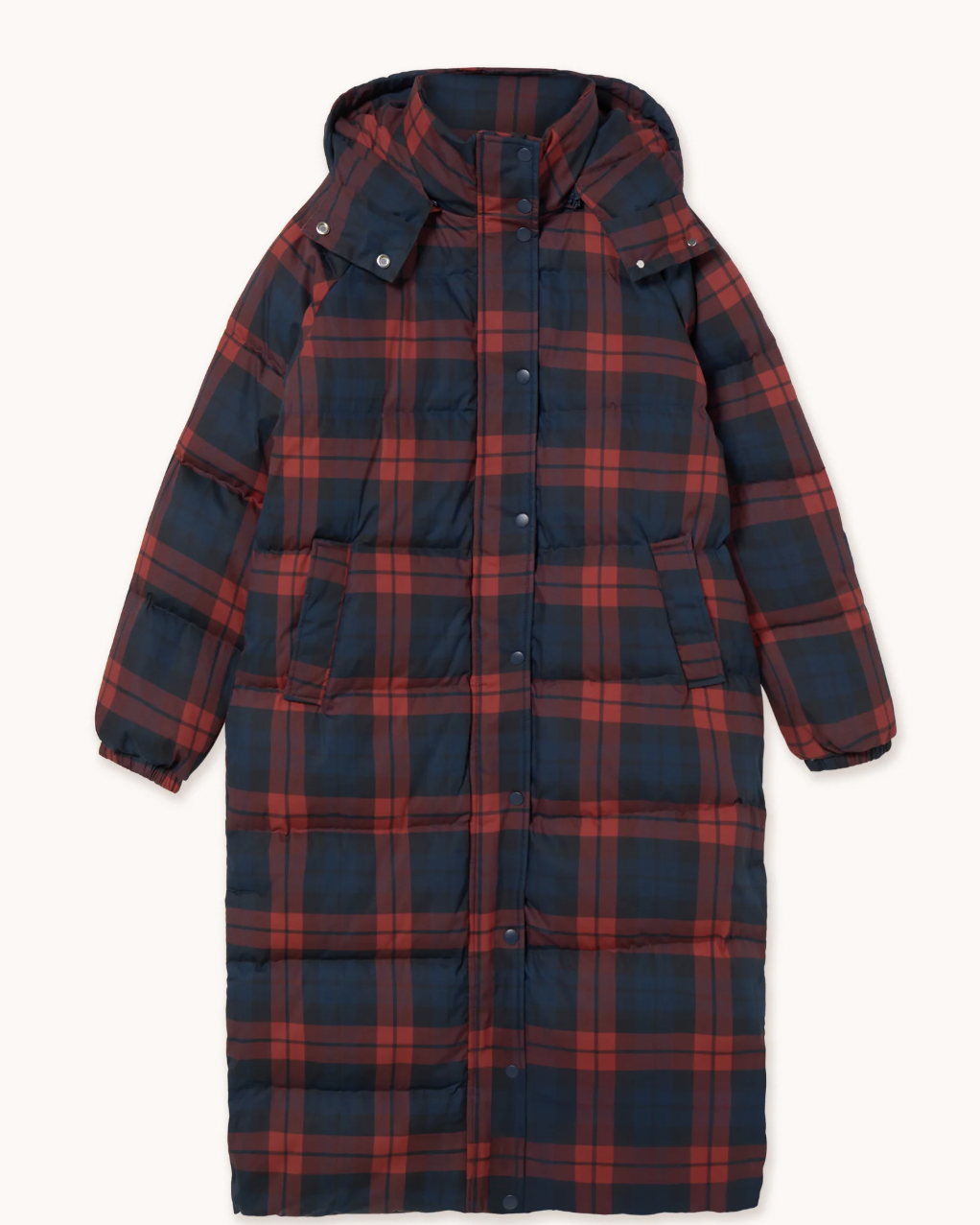 A long hooded puffer coat with a red and navy blue plaid pattern, shown flat against a light cream background.