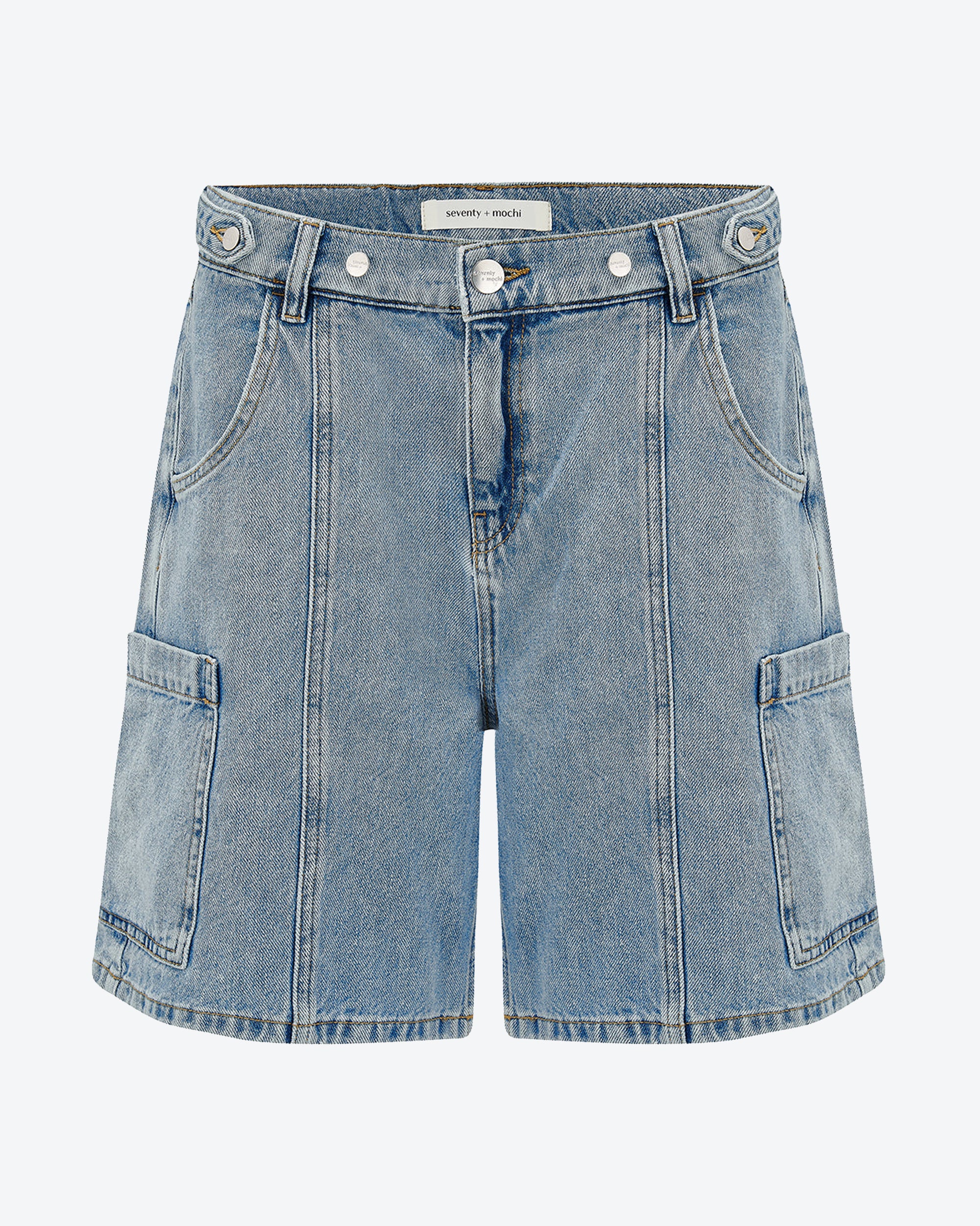 Blue denim shorts on a white background