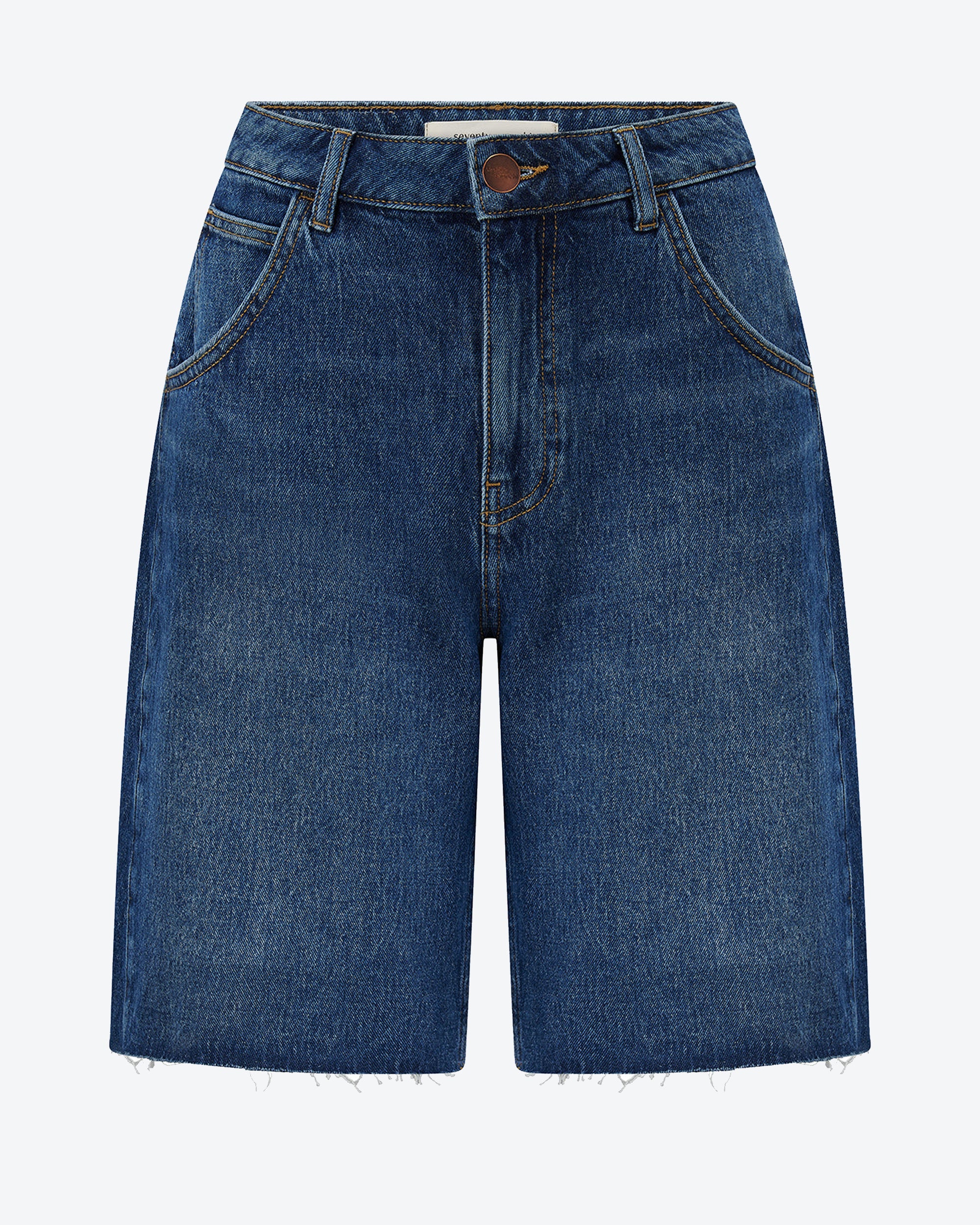 Blue denim shorts on a white background