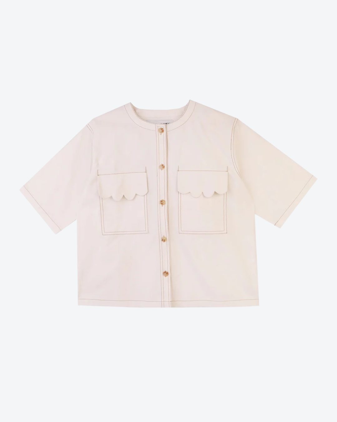 Light pink jacket with button details on a white background