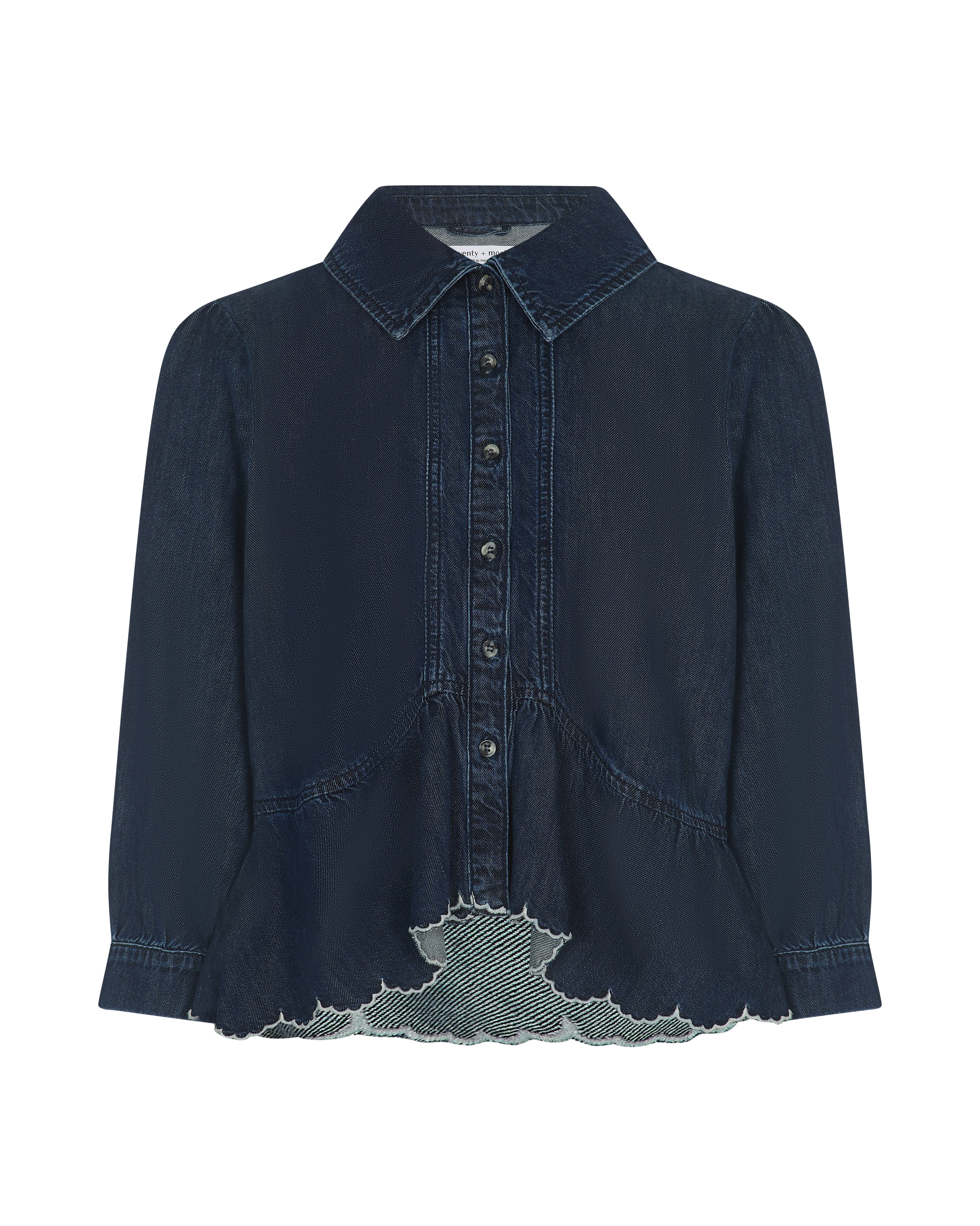 A dark navy blue denim shirt jacket with a pointed collar, button-up front, and a distinctive raw, frayed hem detail showing a lighter gray lining.