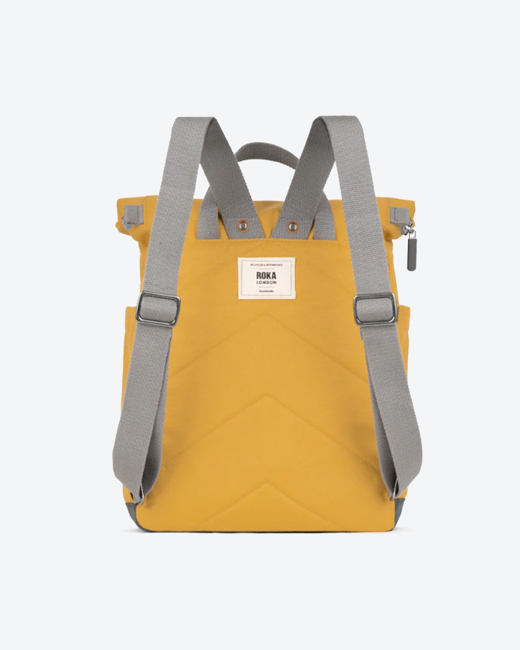 Yellow backpack with gray straps on a white background