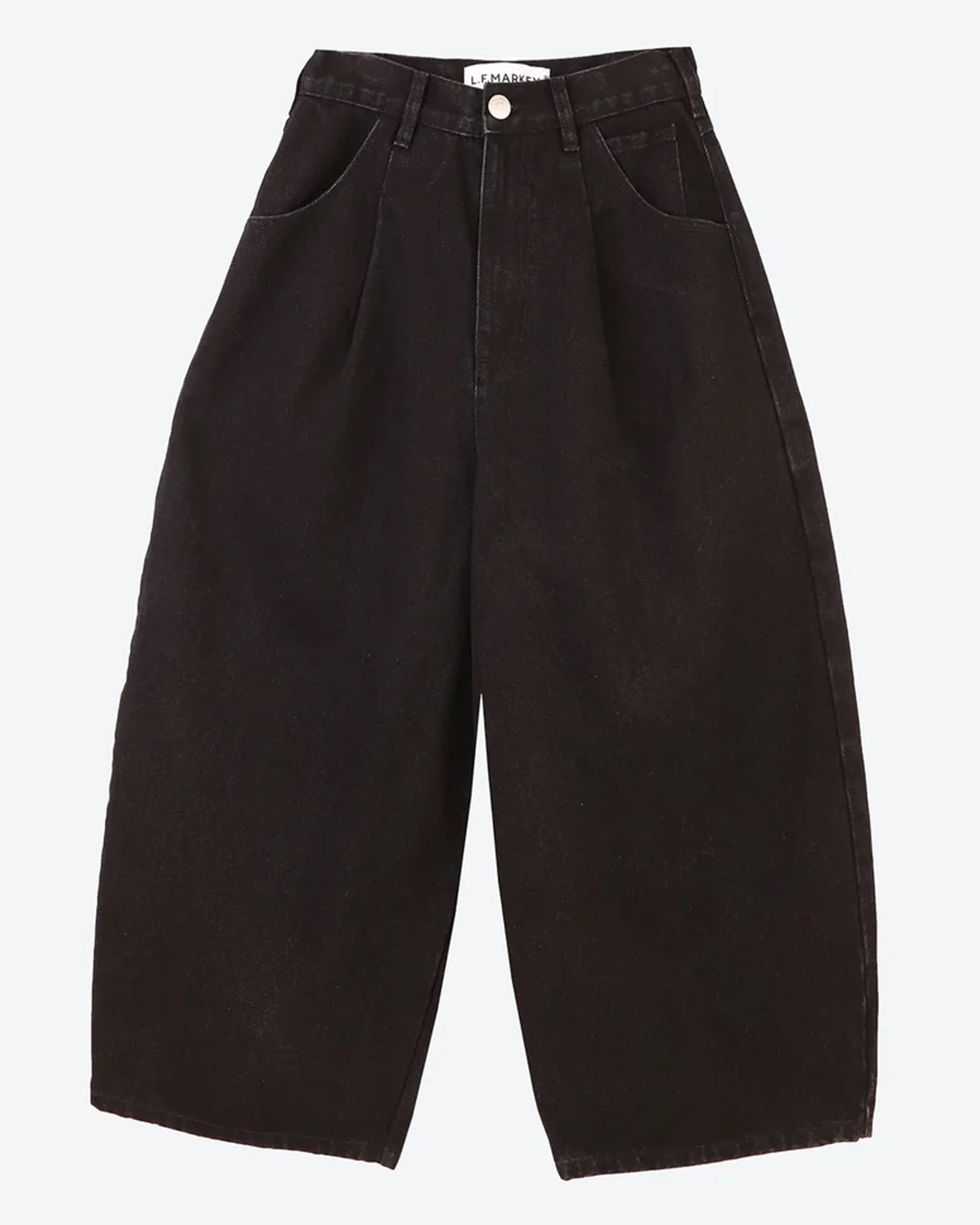 Ankle-length balloon-shaped black jeans with a high waist and pleats, featuring matte silver rivet detailing on the pockets.