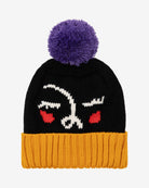 A black and yellow beanie with a purple pom-pom on top, featuring an abstract face design with red accents for eyes and a purple turn-up rim at the bottom.