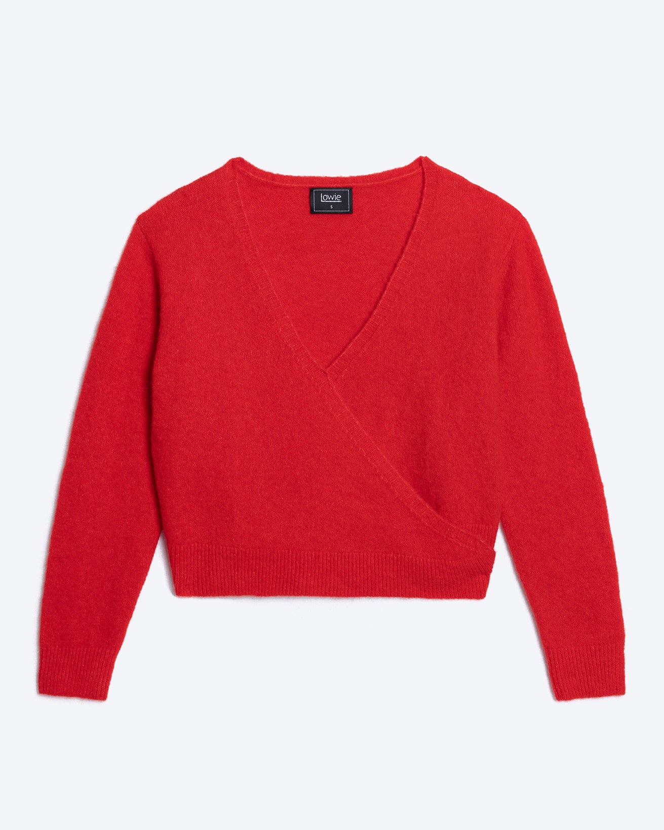 Red sweater on a light gray background