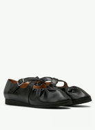 Pair of Naguisa Black Cross Strap Flats