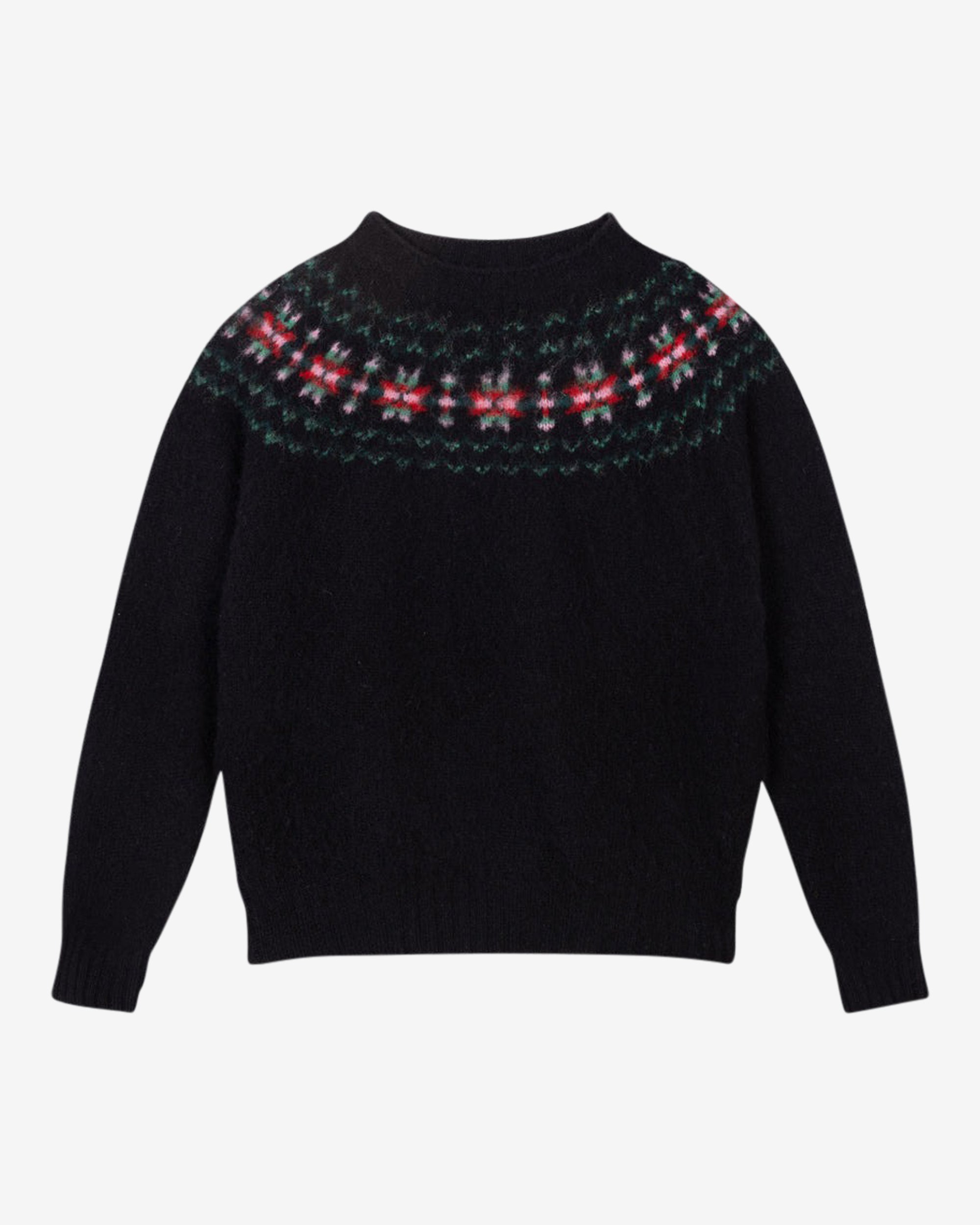 A black sweater with a traditional red, green, and pink fair isle design around the neckline.