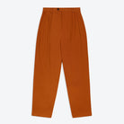 A pair of Lowie Drill Pumpkin Pleat Front Trouser in orange color, made from cotton drill fabric.