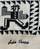 Textured fabric with black and white pattern and 'Bobo Choses' branding.