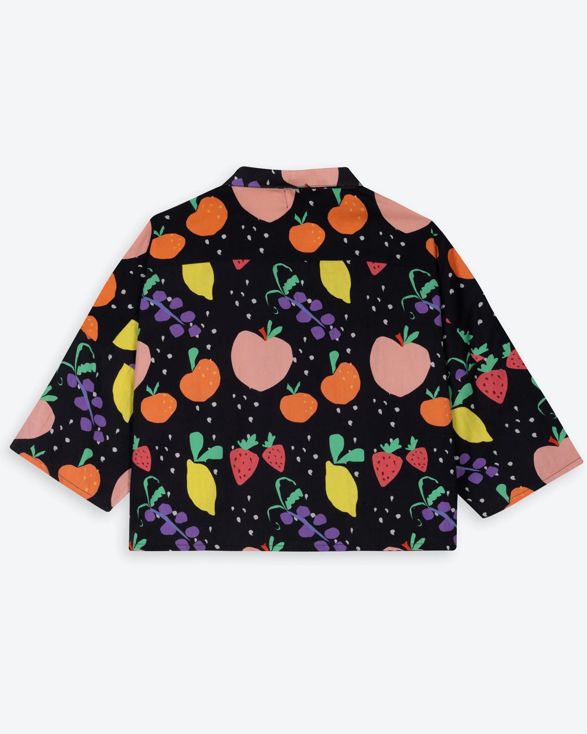 Colorful fruit patterned shirt on a white background