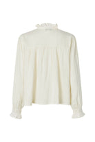 White blouse with ruffled collar on a white background