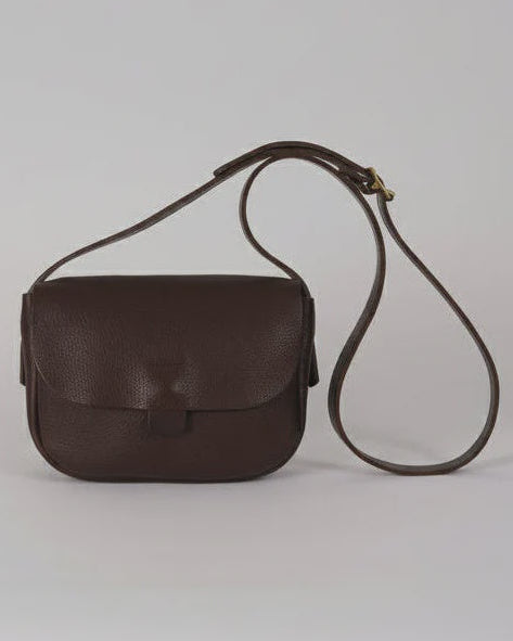 A dark brown textured leather shoulder bag with a long matching strap, displayed against a neutral light gray background.