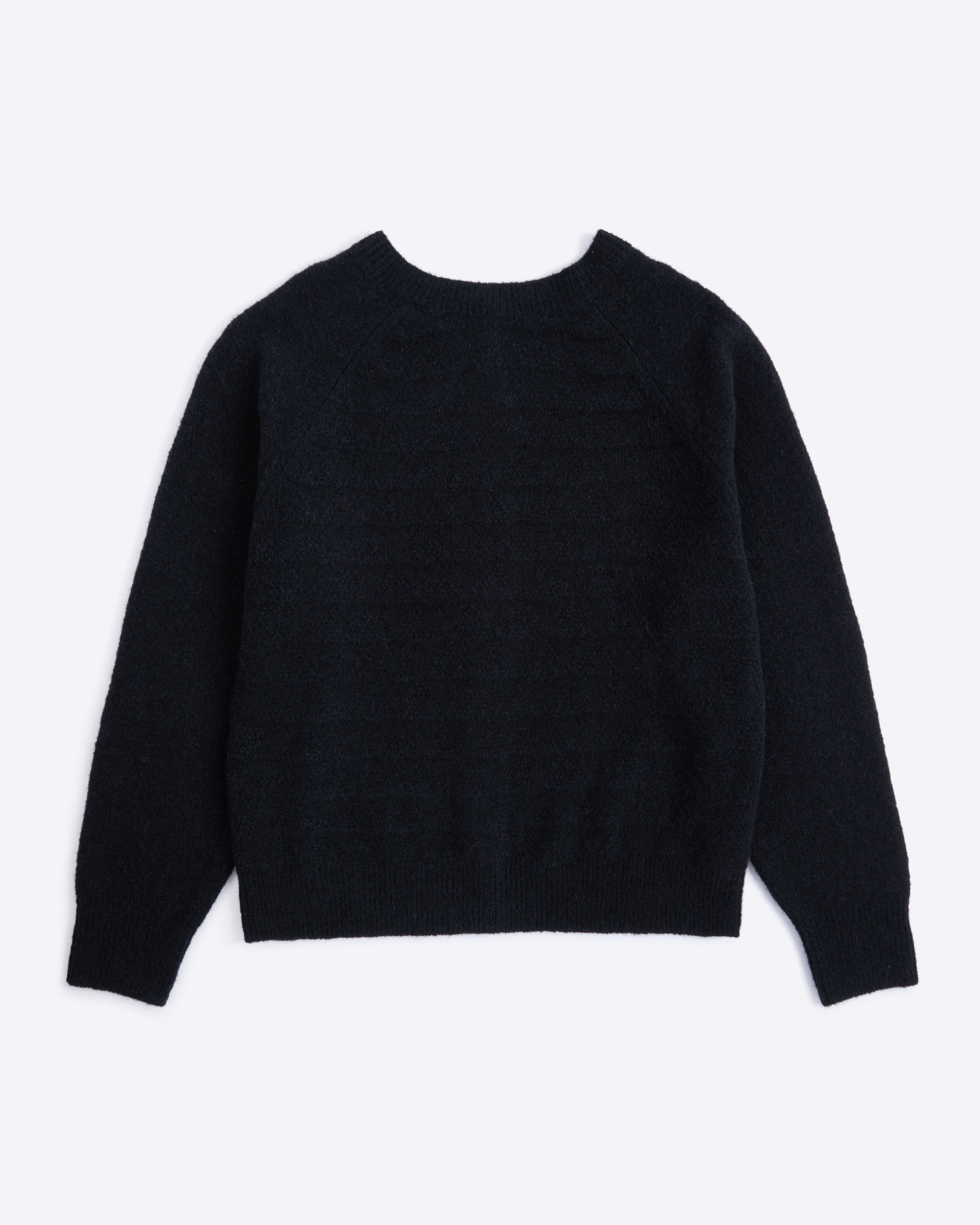 Black sweater on a white background