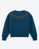 Blue sweater with red pattern on neckline against a white background