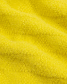 Close-up of yellow fabric texture