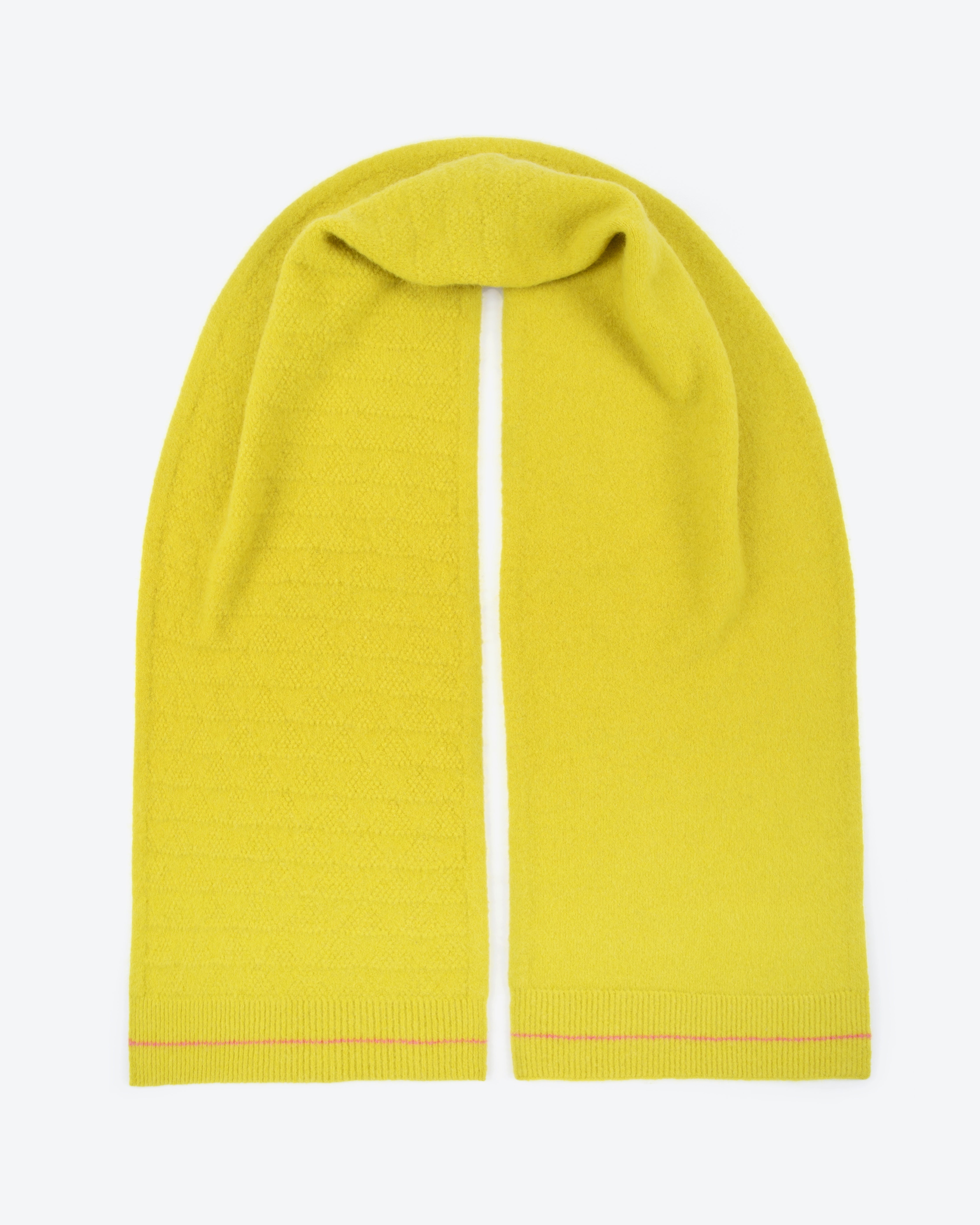 Yellow scarf with a white stripe on a light gray background