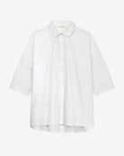 White shirt on a light gray background