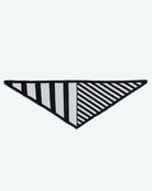 Black and white striped triangle-shaped object on a white background