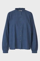Blue striped blouse on a light gray background