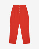 A pair of red cotton linen trousers with side welt pockets and a row of buttons down the front.