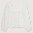 A white Tencel blouse with a square neckline, long sleeves, and elastic cuffs on a plain background.