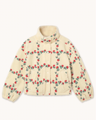 A cream-colored sherpa jacket with an all-over red rose and green vine pattern, displayed flat against a light off-white background.