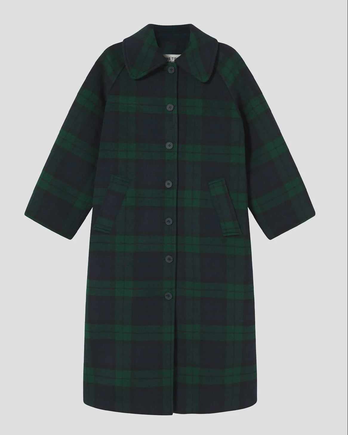A dark green and black plaid coat with a collar and front buttons, displayed against a solid gray background.
