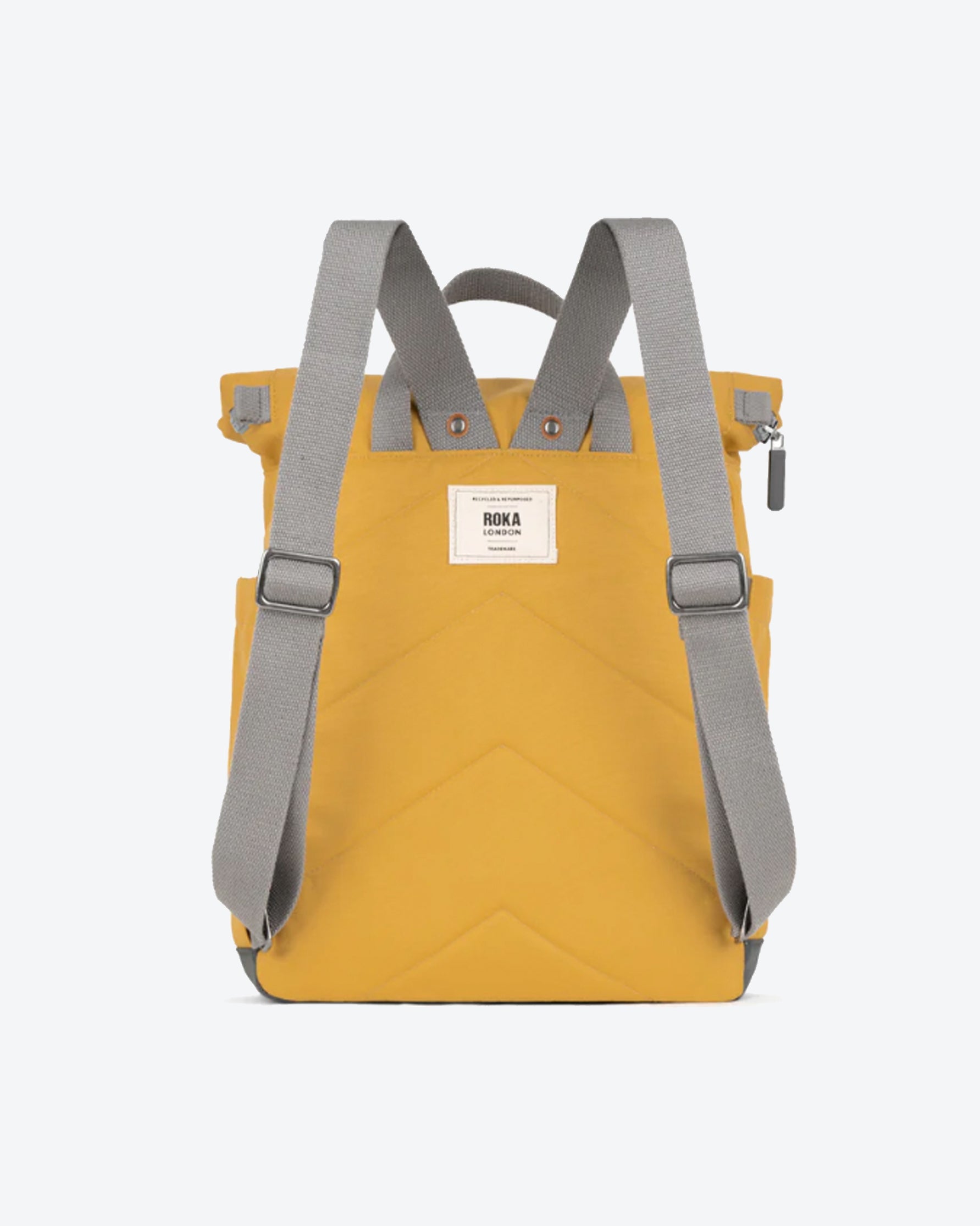 Yellow backpack with gray straps on a white background