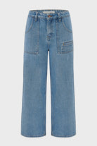 Blue jeans on a light gray background