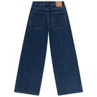 Back view of a pair of blue jeans on a white background