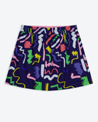 A navy blue skort with a bright and neon scribble print, featuring an elasticated waist and side pockets.
