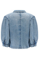 Blue denim jacket on a white background