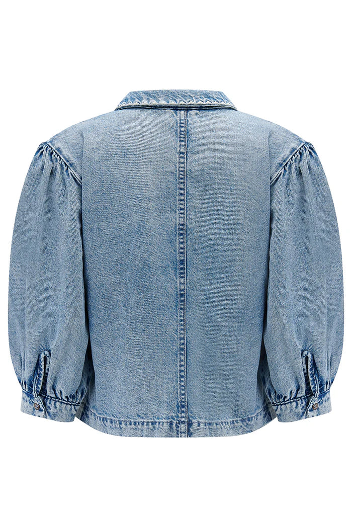 Blue denim jacket on a white background